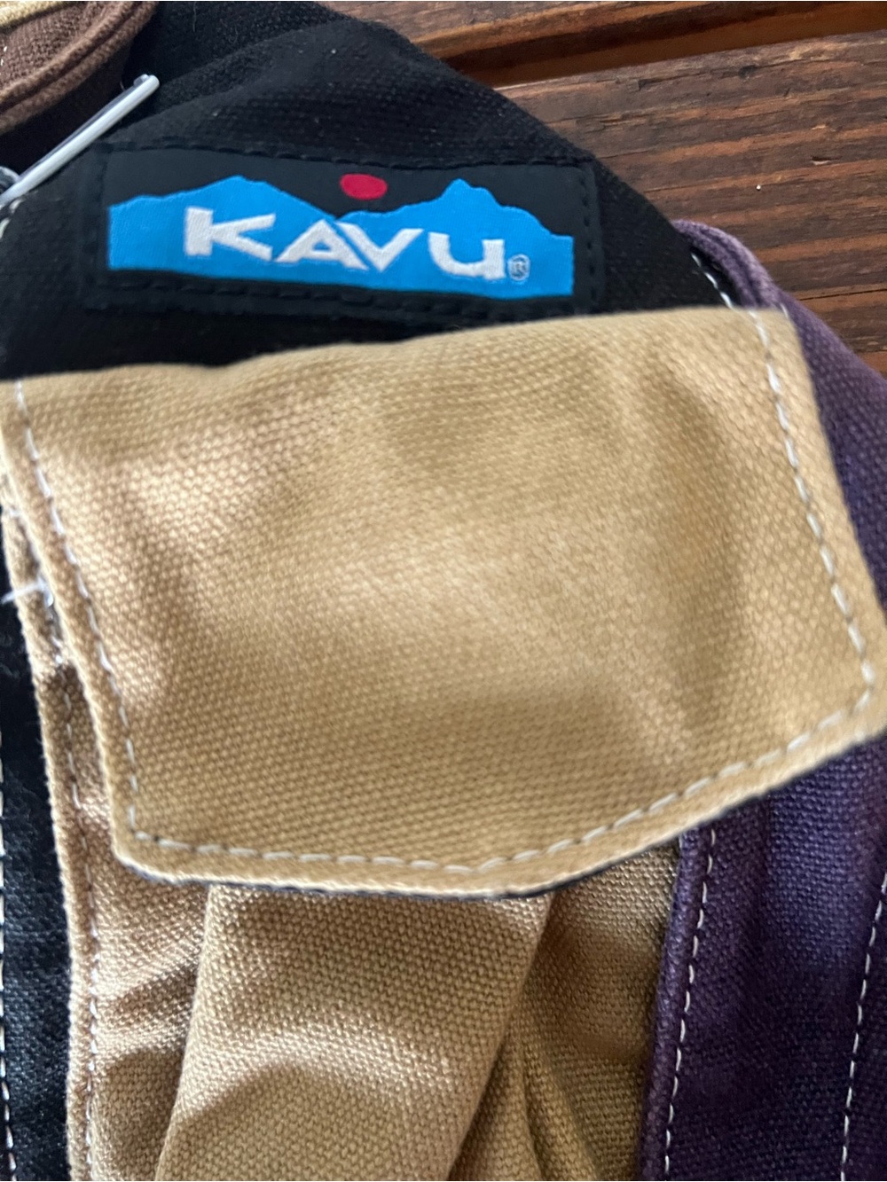 Kavu Tan and Purple Sling Bag with Black Accents